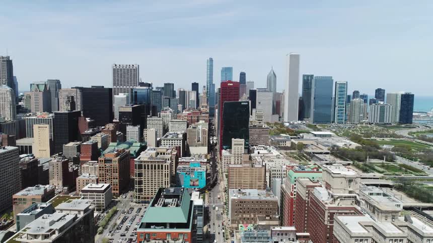 Aerial view of a downtown city during spring is displayed