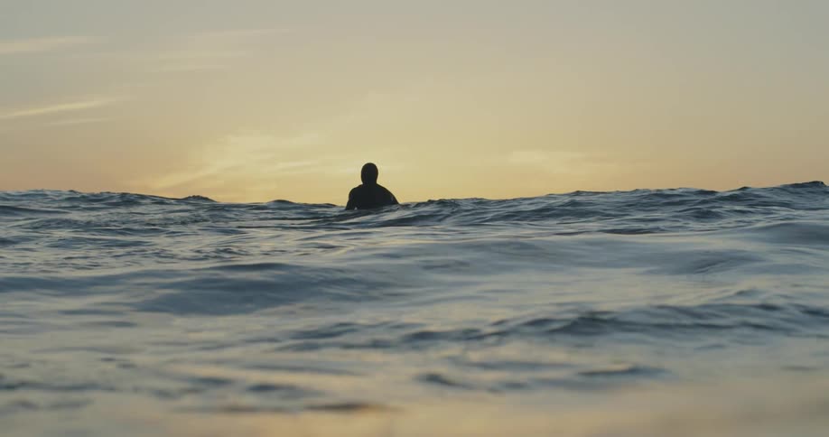 A man swimming in the ocean