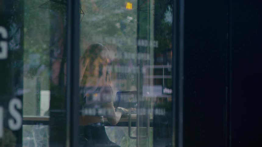 A customer walking into a restaurant