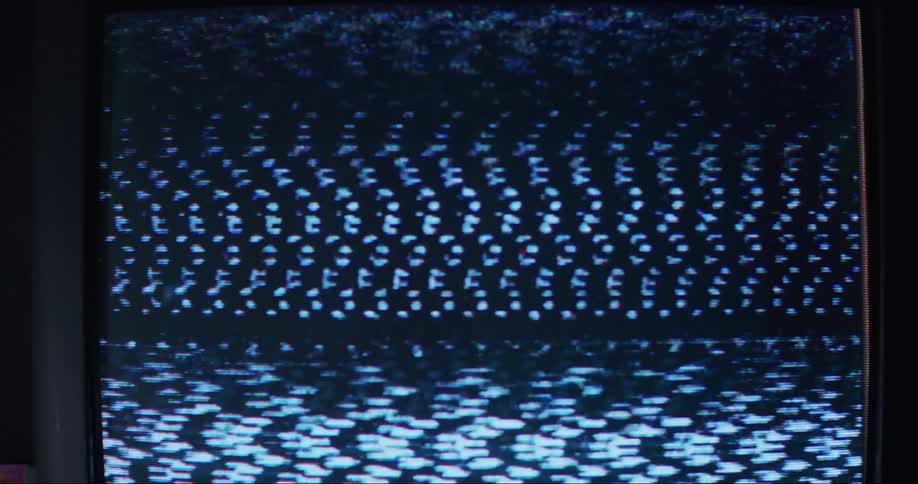 Close up of computer graphics displaying on a vintage television