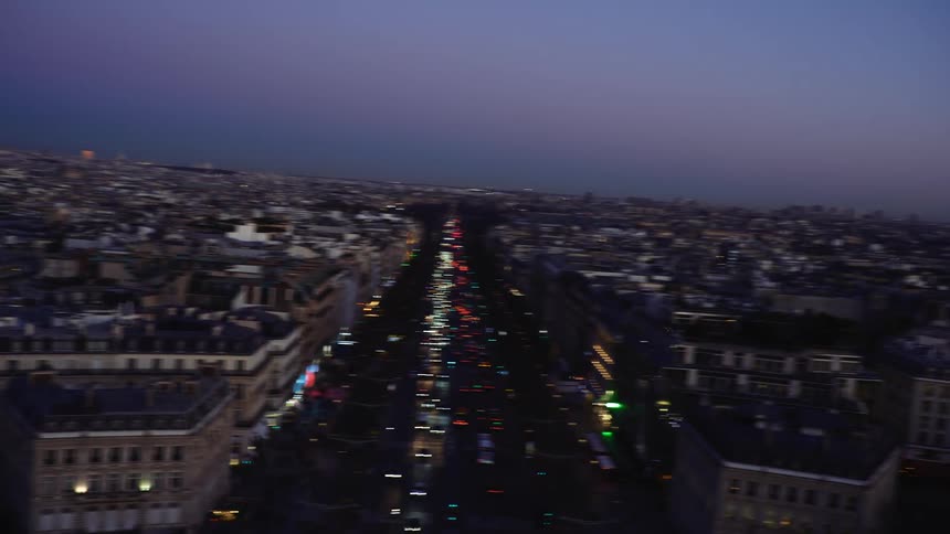 Aerial view of a downtown city at dusk