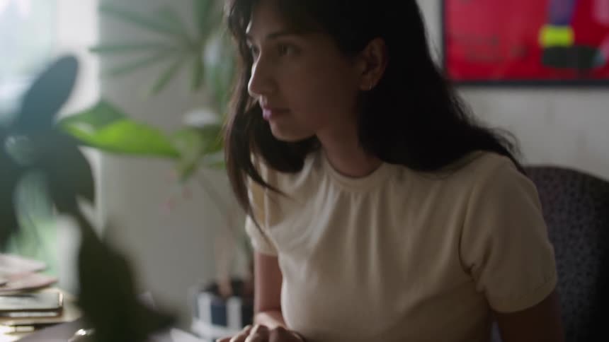 A girl is studying a book
