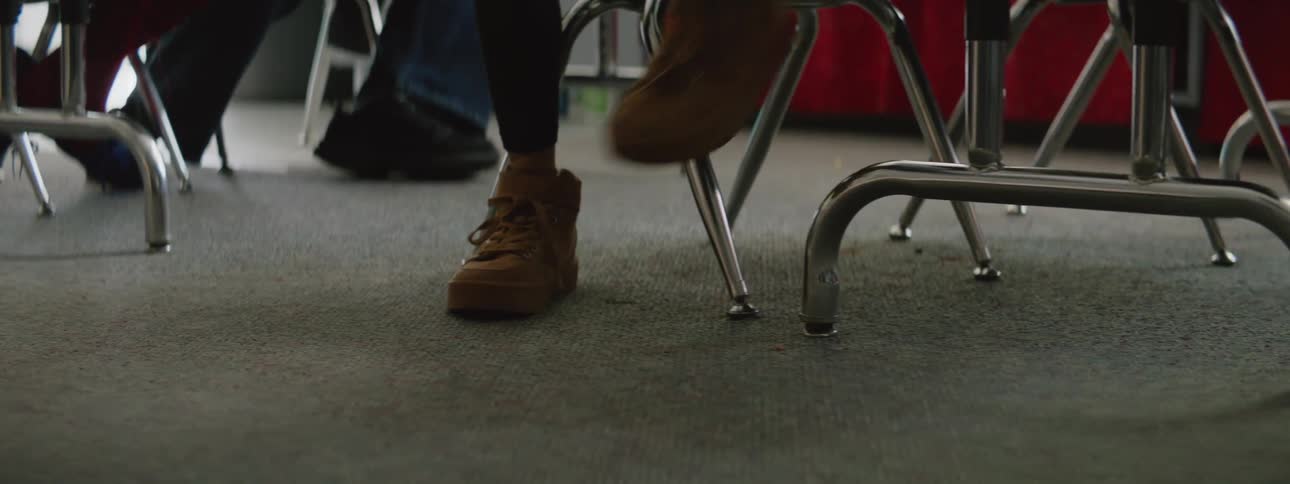A person gets up and walks