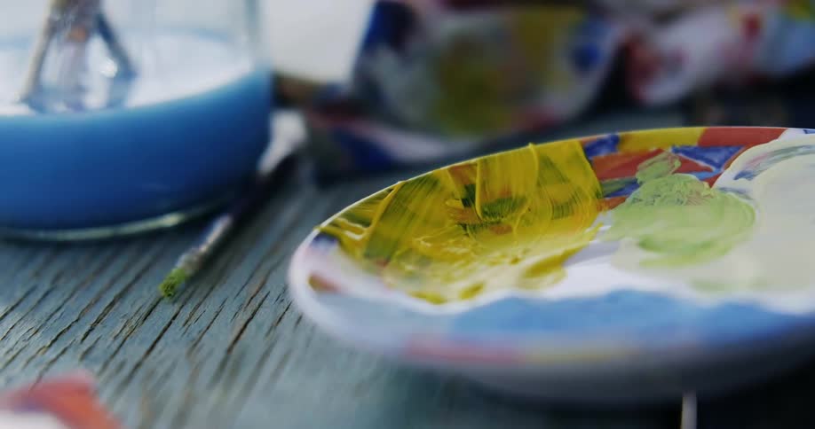 Paint supplies are on the table