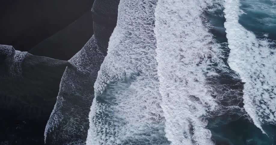 Waves are crashing on the shore