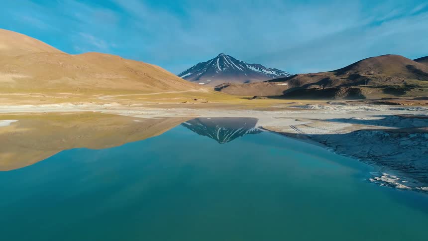 The mountain is reflecting on the water