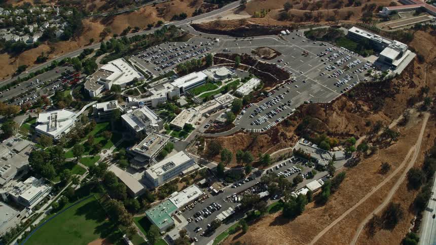An impressive aerial shot orbiting away from the College of the Canyons campus in Santa Clarita California