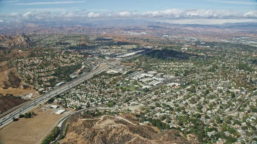 Aerial view of Wiley Canyon Elementary School storage facilities and retail spaces in Santa Clarita California on a partly cloudy day