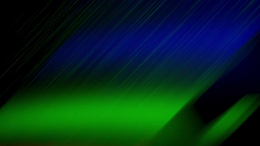 Green and blue special effect colors blended together and forming streaks of texture