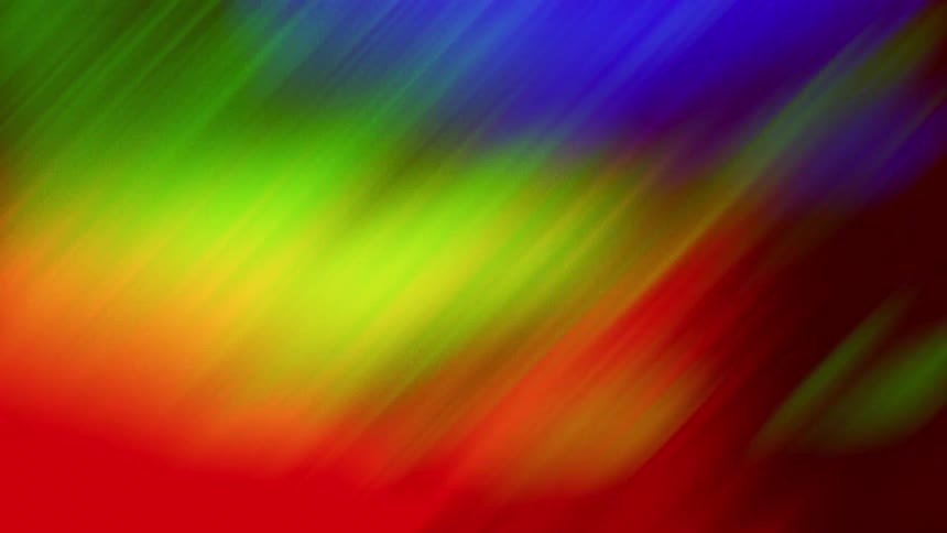 Streaks of colored light glow as they move and illuminate the darkness