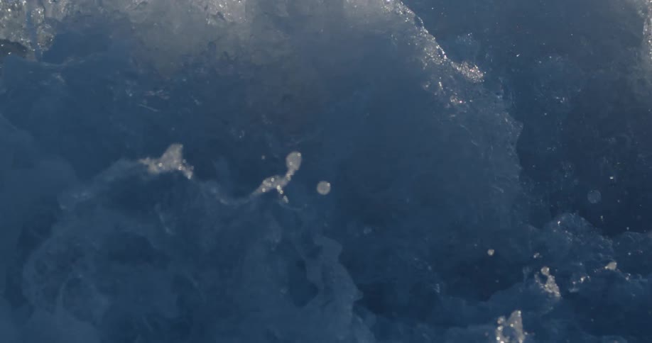Close up of foamy water crashing
