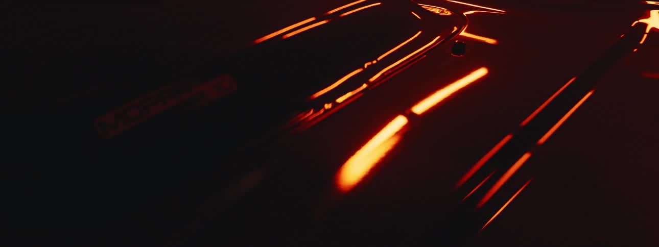 The view is of a portrait of a car