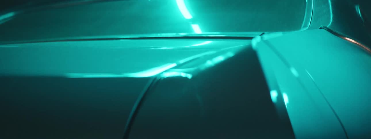The view is of a car that is driving outdoors in the day time