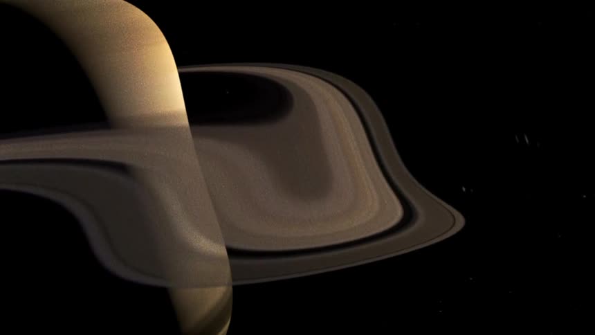 Image displays warped image of the planet saturn and its rings