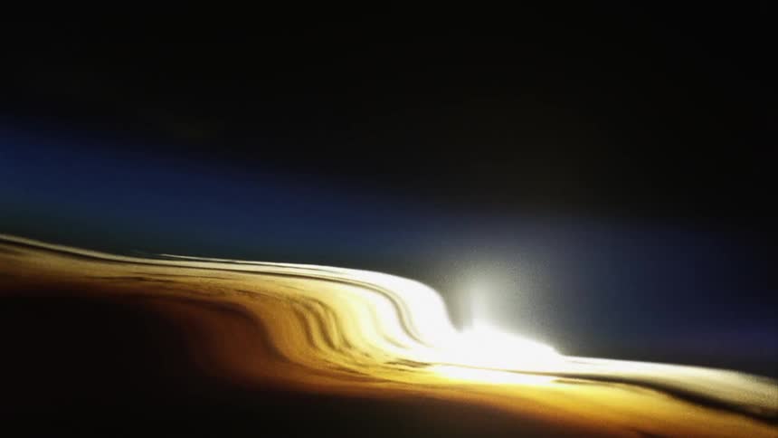 Distorted footage of a time lapse of the sun rising over the clouds