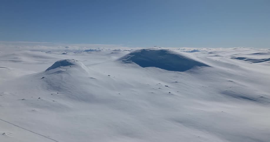 Aerial view of mountains during winter season