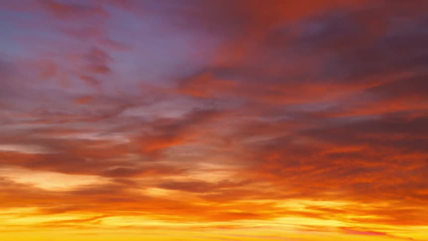 Clouds and sky are displayed during sunset