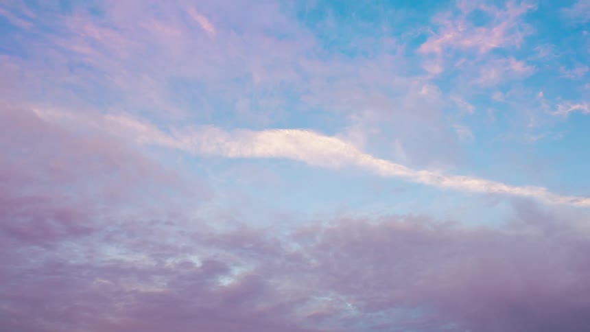 An aerial of the sky with whispy clouds across it