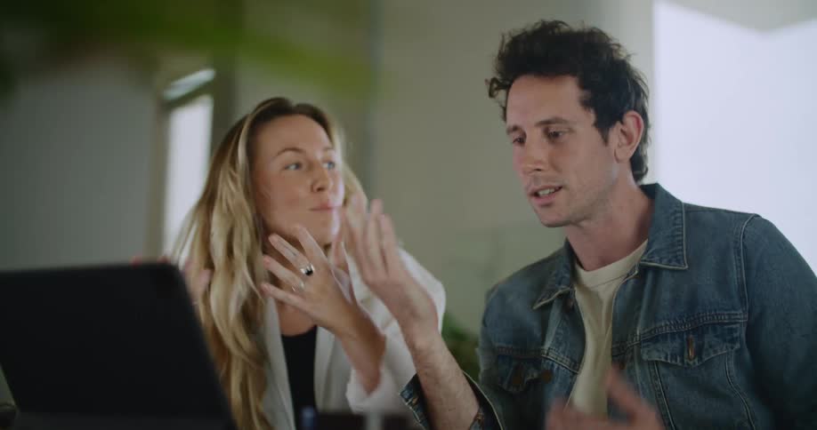 Man and woman discussing something together