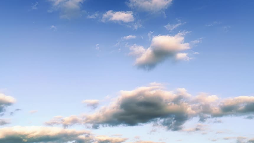 Time lapse view of clouds moving in the blue sky