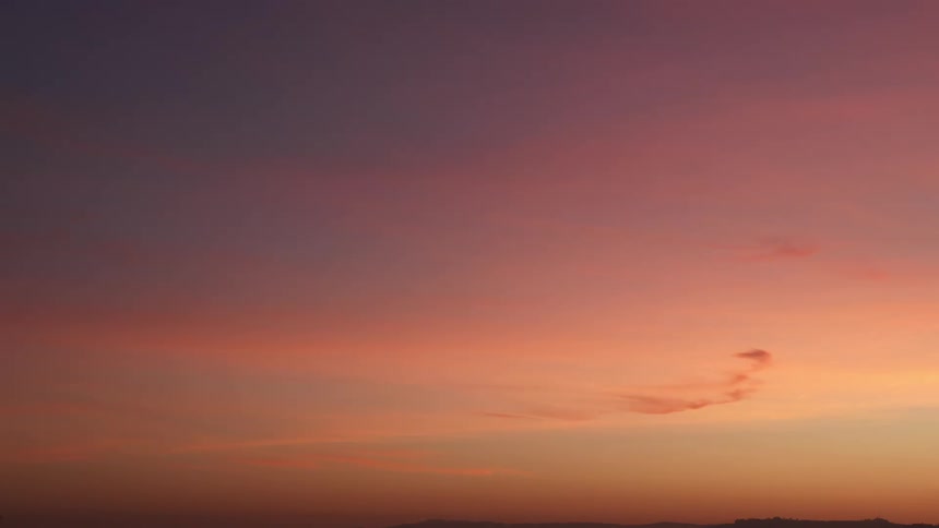 The view is of the sky and the sun light in the morning