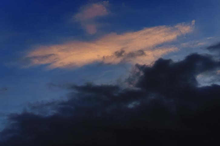 The view is of the sky and you can see the clouds as well