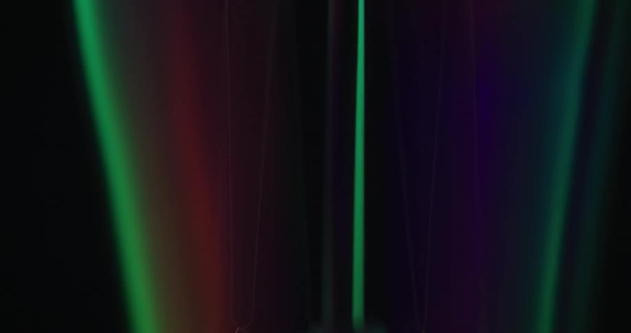 Neon lines appear against a black background