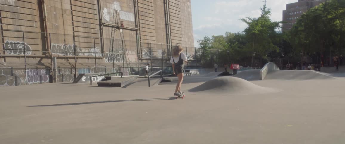 Woman Skateboarding In New York