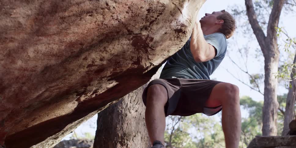 A man is rock climbing
