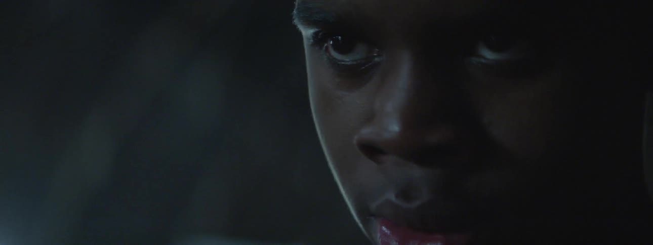 A man looks at something intently