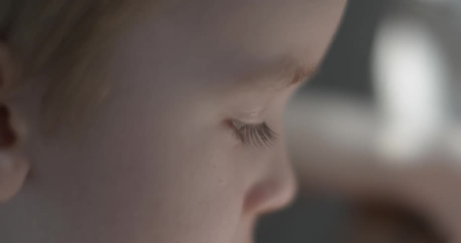 A child is looking down