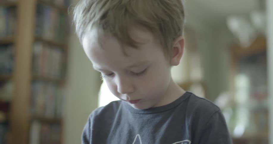 Young boy playing in a room