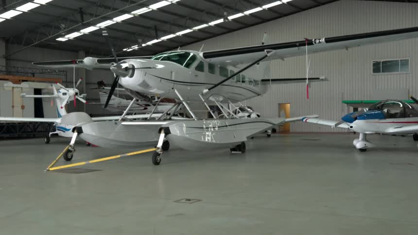 A seaplane sits in a hanger