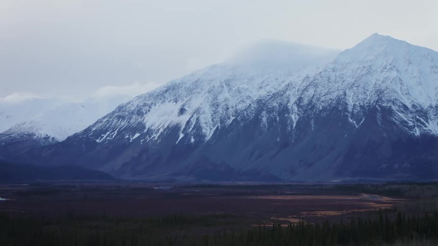 A mountain range is shown in the horizon