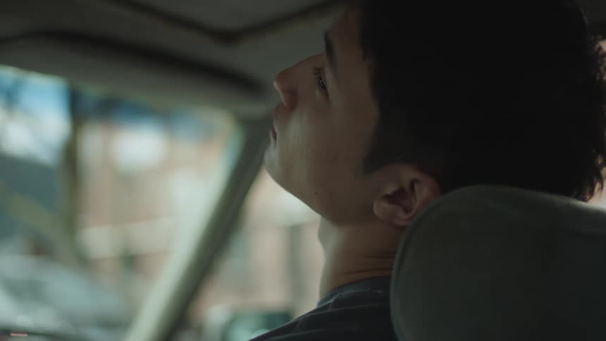 A man is sitting in the car