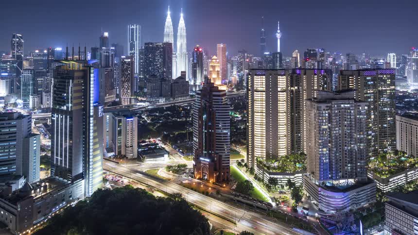 Time lapse of traffic and lights on the Kuala Lumpur skyline at night