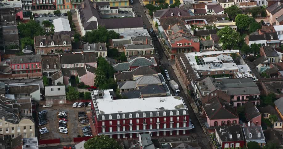 Aerial view of a French Quarter apartment building and street in New Orleans during summer