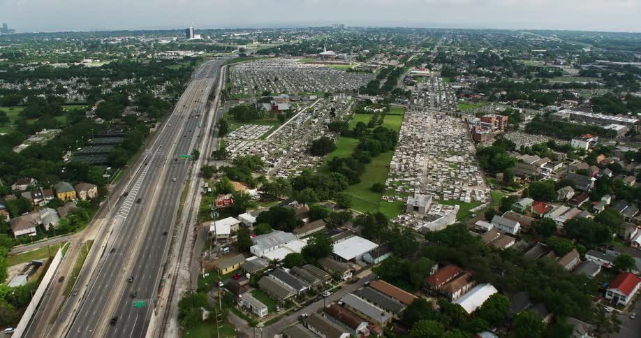 An aerial view of cemeteries in Lakeview New Orleans during partly cloudy skies