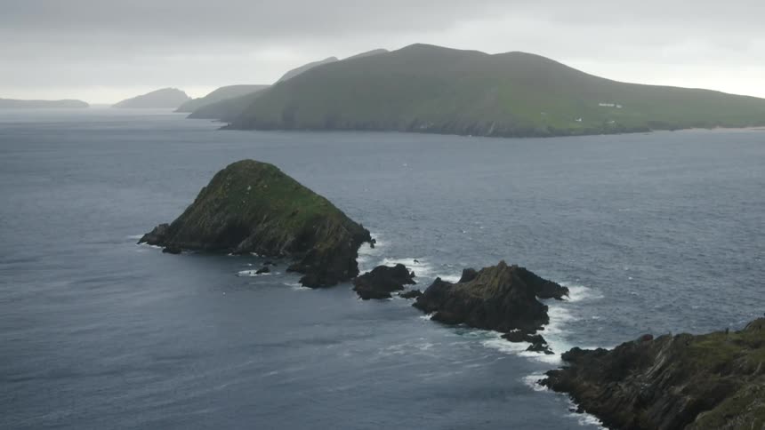 Aerial view of an ocean and islands are displayed