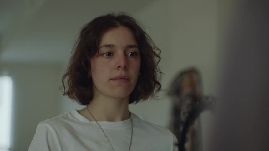 Portrait of a female walking in her house
