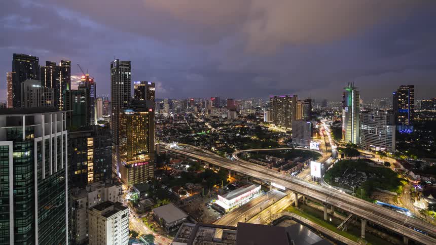 Time lapse view of traffic in downtown metropolitan Kuala Lumpur