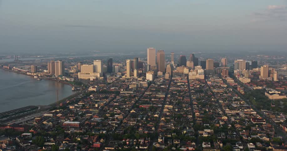A breathtaking 4K aerial footage of New Orleans at sunrise with skyscrapers towering over the bustling metropolis