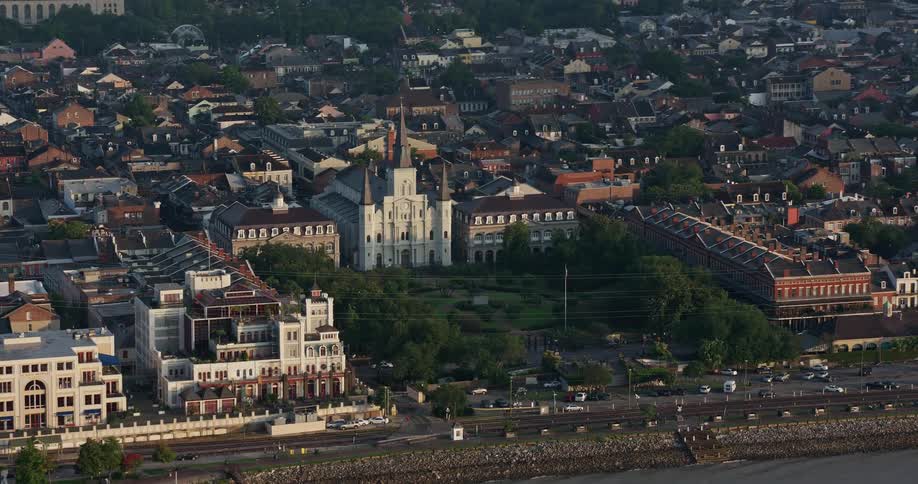 St Louis Cathedral and Jackson Square in the French Quarter of New Orleans are seen from a reverse aerial view during sunrise in Louisiana
