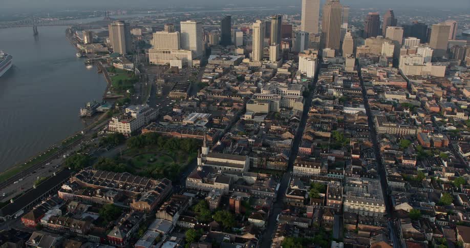 A stunning 4K aerial footage of St Louis Cathedral and Jackson Square at sunrise revealing the historic landmark and downtown New Orleans Louisiana
