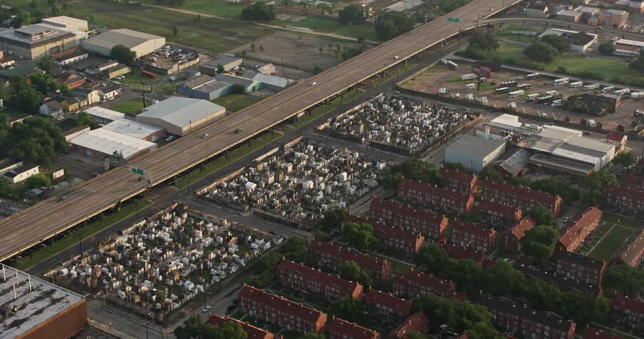 Aerial footage of three cemeteries in the French Quarter during sunrise in New Orleans Louisiana
