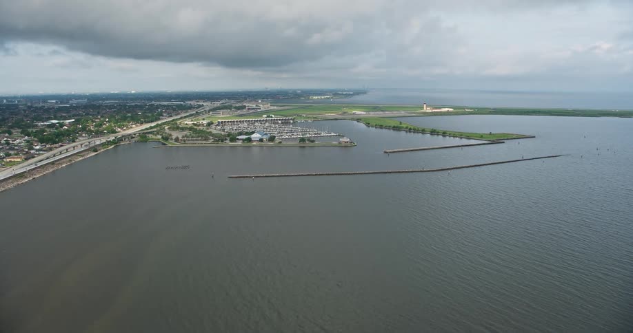 A beautiful 4K aerial view of a marina on Lake Pontchartrain at sunrise in Louisiana