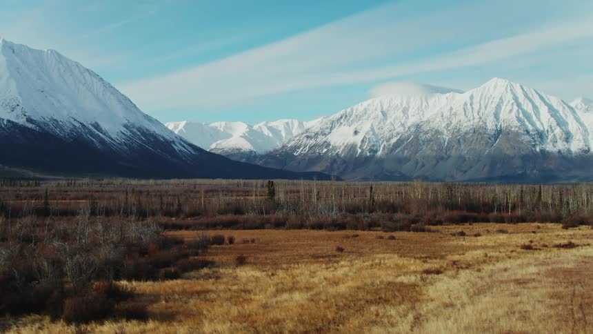 Mountains in the landscape are displayed in winter