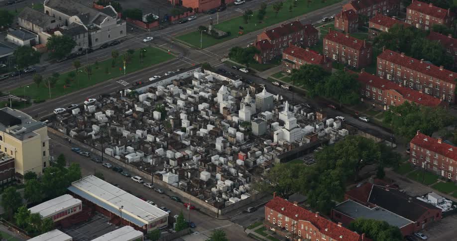 Aerial footage at sunrise captures the serene beauty of St Louis Cemetery in French Quarter New Orleans Louisiana