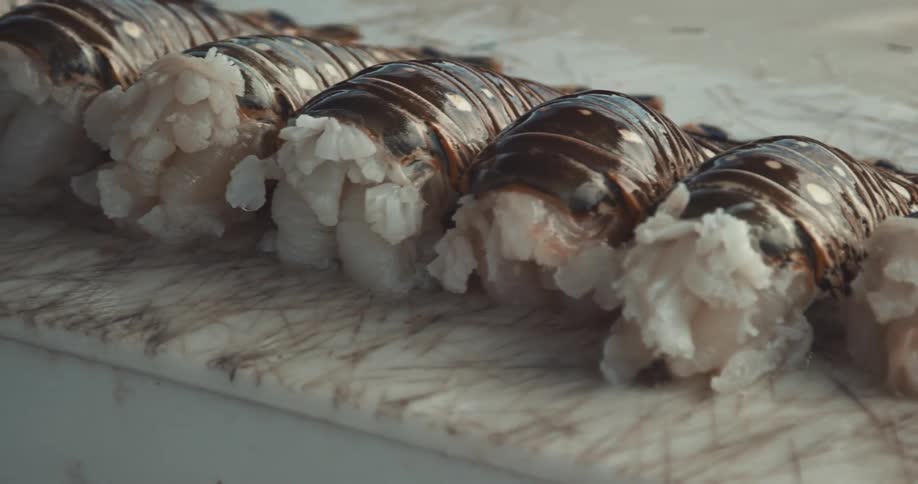 A close up of brown seafood on a white counter