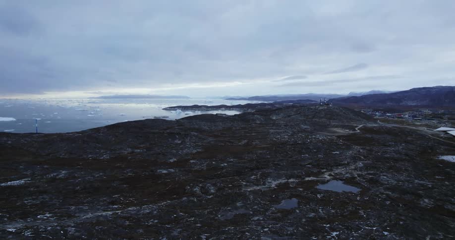 Aerial view of a landscape is displayed on a cloudy day